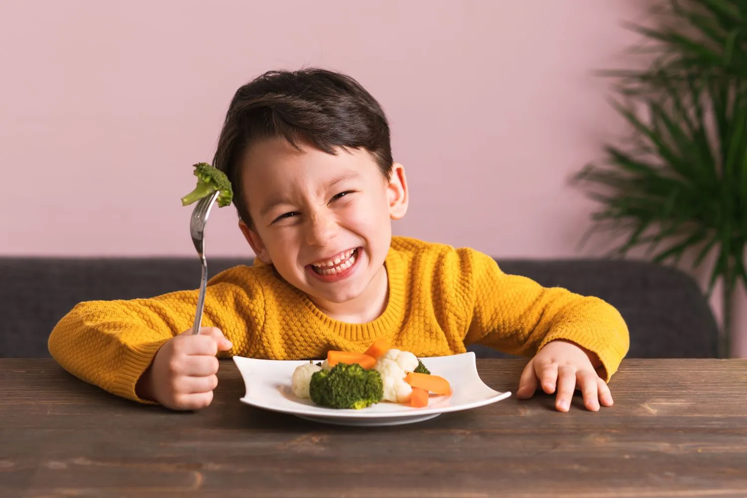 child eating healthy vegetables